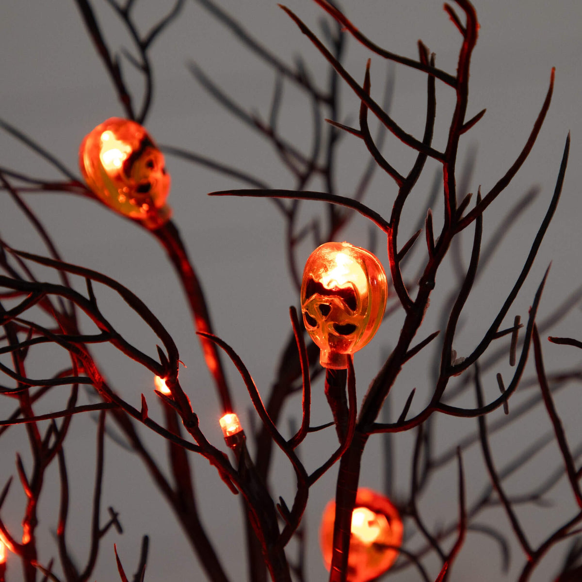 22" Pre-Lit Artificial Halloween Brown Twig Tree with 12 Orange LED Pumpkin Shaped Lights - Che Cose Belle