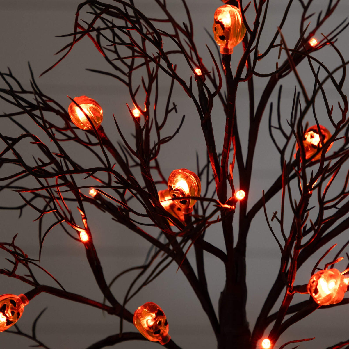 22" Pre-Lit Artificial Halloween Brown Twig Tree with 12 Orange LED Pumpkin Shaped Lights - Che Cose Belle