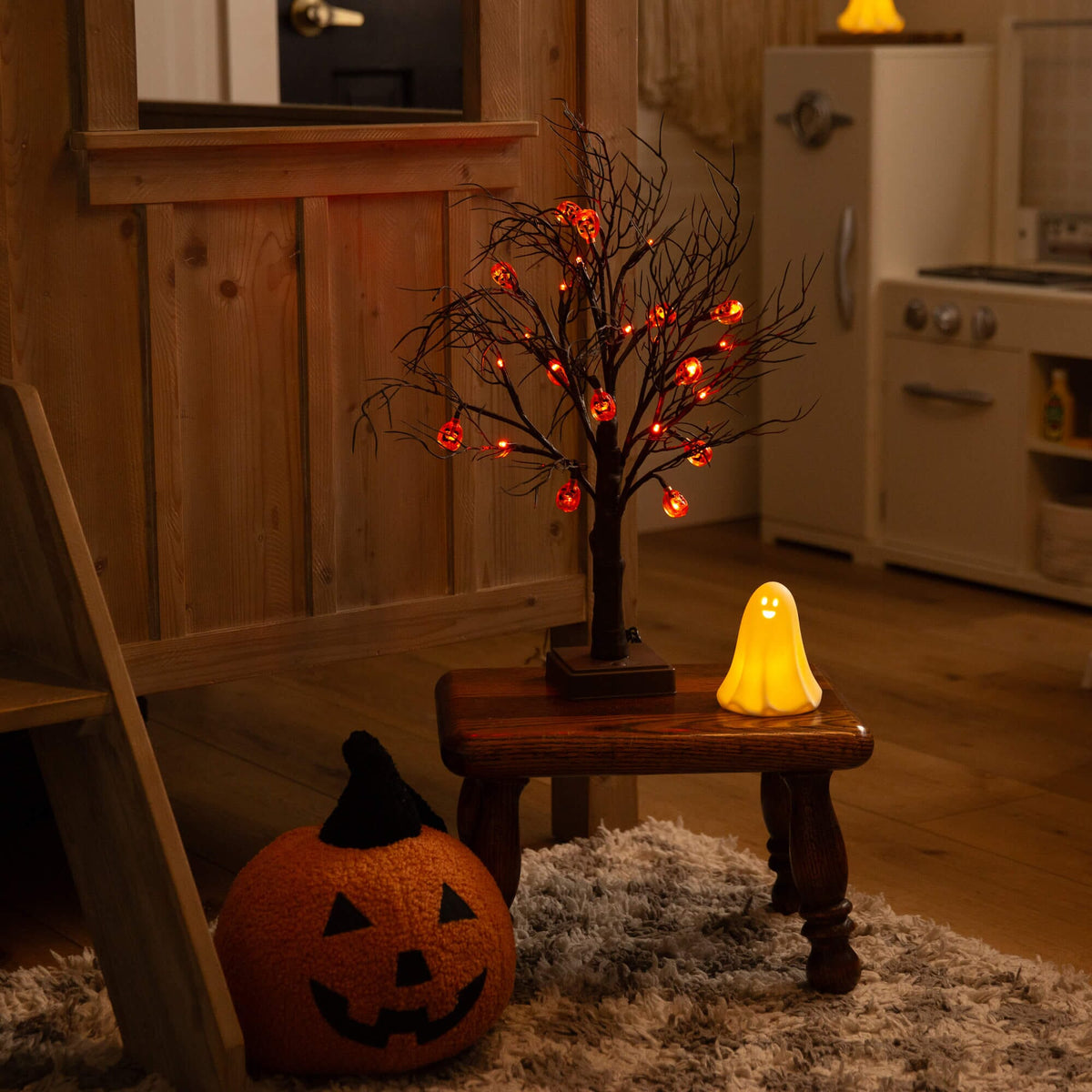 22" Pre-Lit Artificial Halloween Brown Twig Tree with 12 Orange LED Pumpkin Shaped Lights - Che Cose Belle