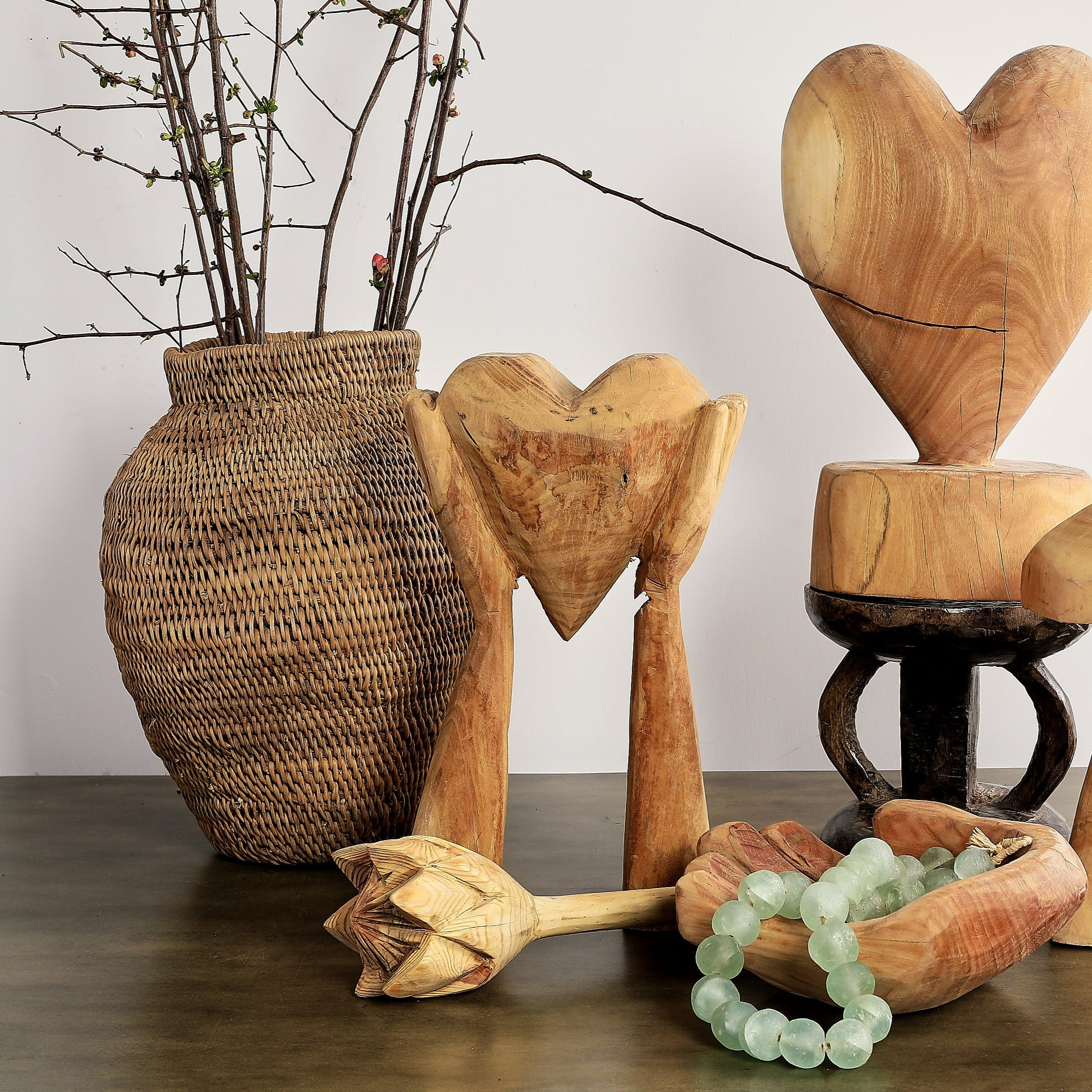 Hands Holding Heart Sculpture