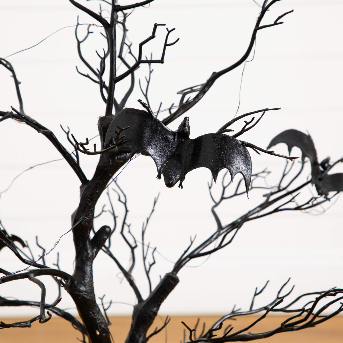 3' Pre-Lit Artificial Halloween Black Spooky Twig Tree with Bats and 100 Orange & Purple LED Lights - Che Cose Belle