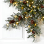 30” Pre-Lit Flocked Snowflake Artificial Dunhill Fir Wreath with Pinecones and 40 LED Lights - Che Cose Belle