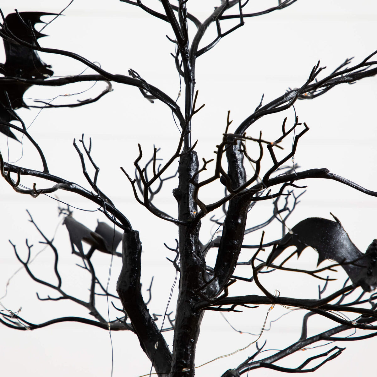 4' Pre-Lit Artificial Halloween Black Spooky Twig Tree with Bats and 120 Orange & Purple LED Lights - Che Cose Belle
