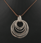 🔘 7-Layered Asymmetrical Circle Pendant Necklace – Bold. Minimal. Fabulous. - Che Cose Belle