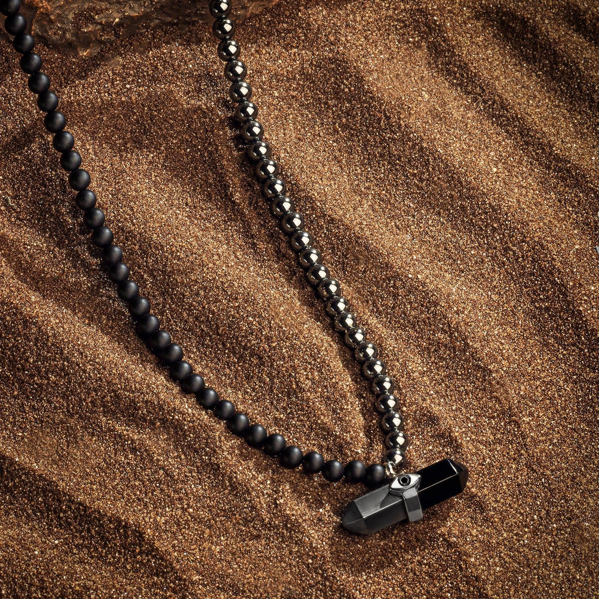Stabilizing Energy - Hematite Onyx Evil Eye Pointer Necklace
