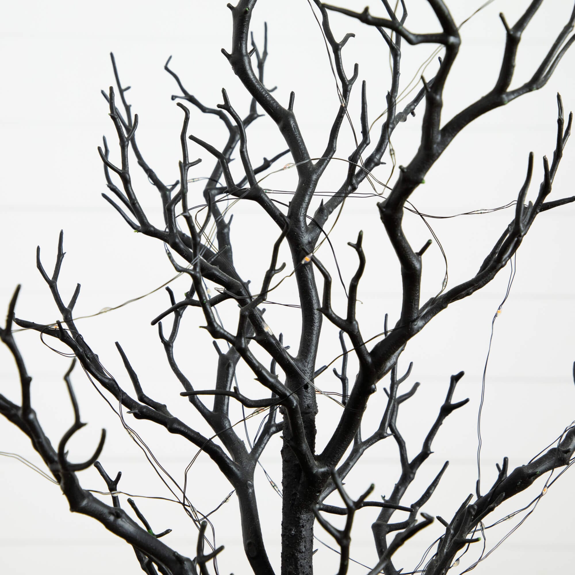 2' Pre-Lit Artificial Halloween Black Spooky Twig Tree with 60 Orange & Purple Copper Wire String LED Lights