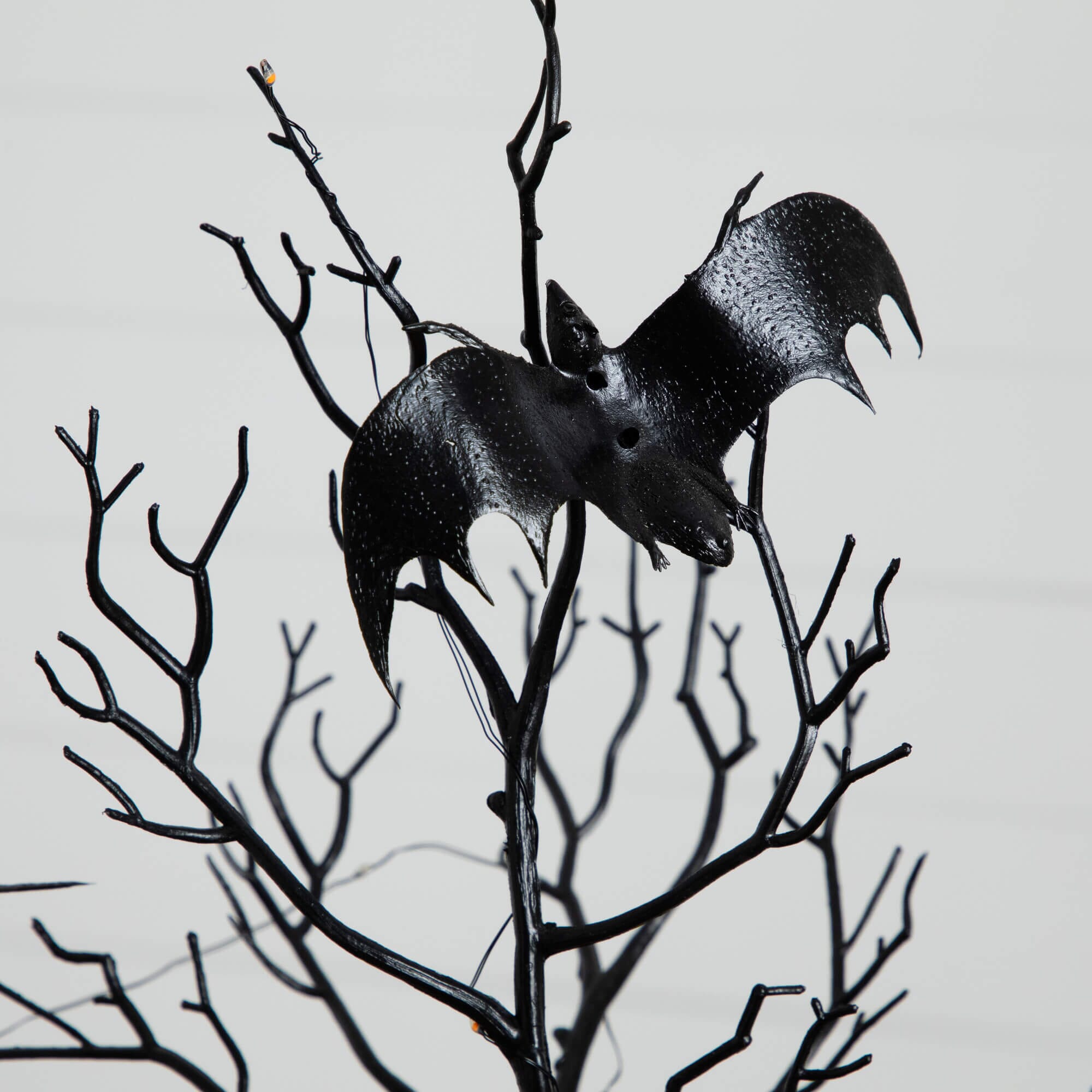 2' Pre-Lit Artificial Halloween Black Spooky Twig Tree with Bats and 40 Orange & Purple LED Lights