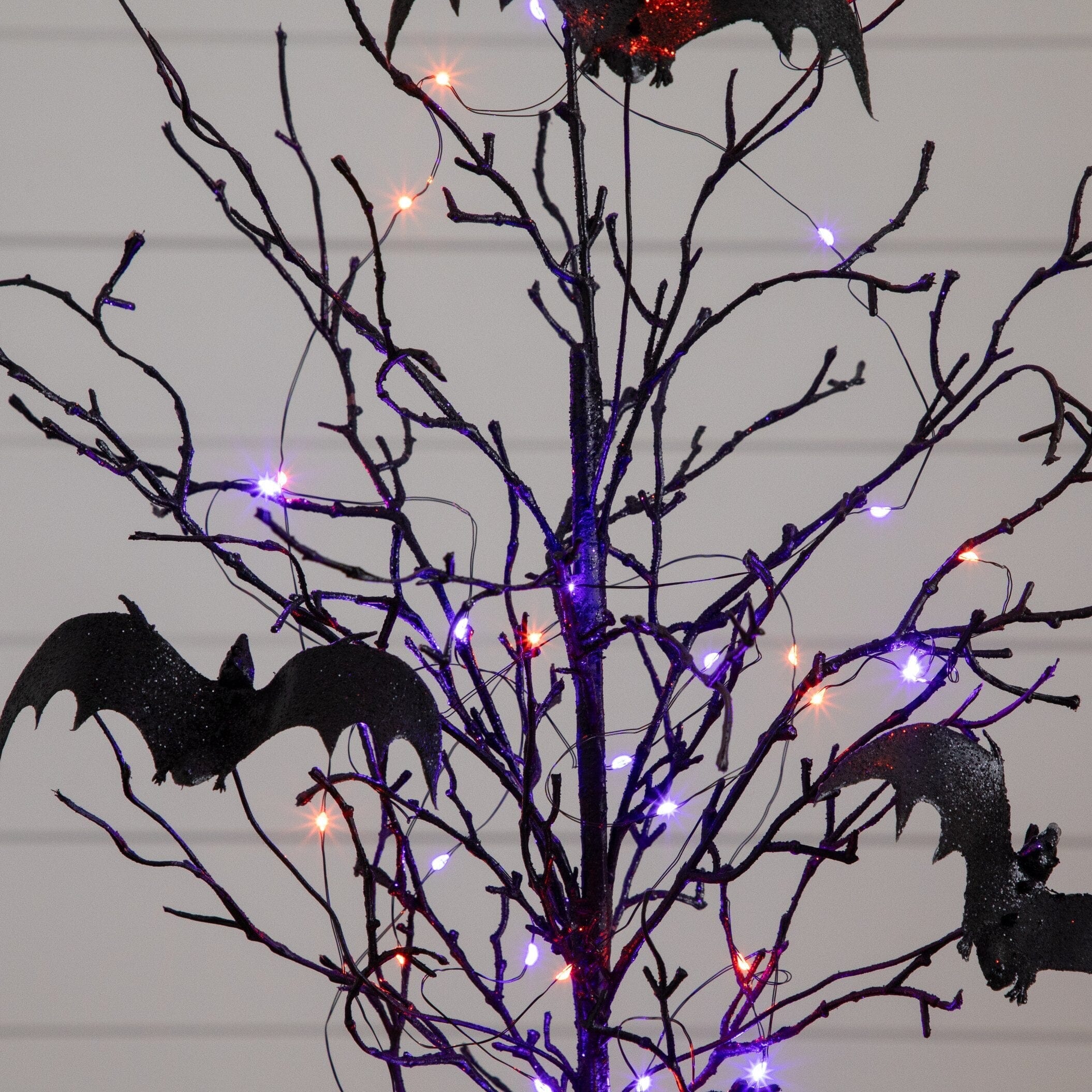2' Pre-Lit Artificial Black Spooky Twig Tree with Bats and 40 Orange & Purple LED Lights