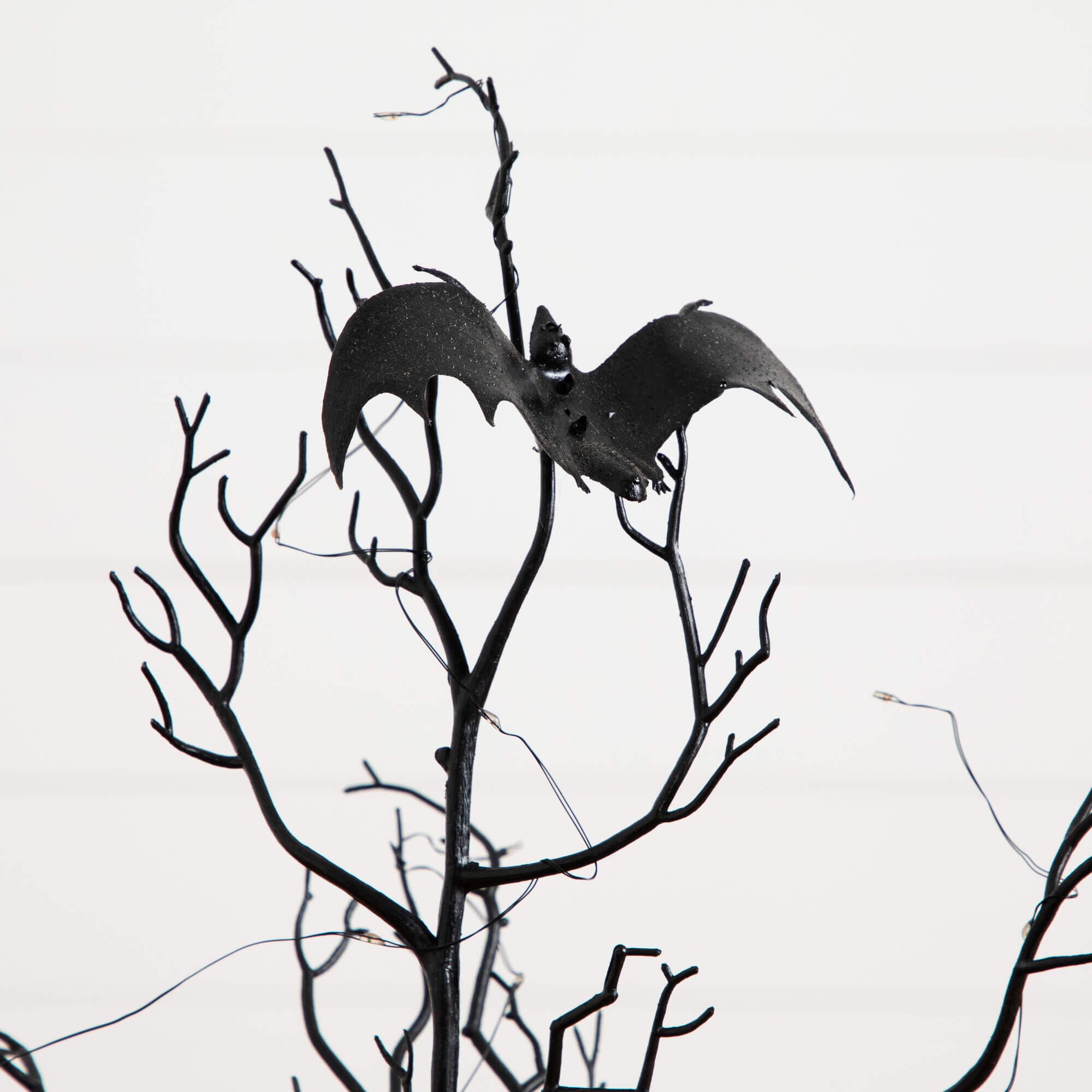 3' Pre-Lit Artificial Halloween Black Spooky Twig Tree with Bats and 100 Orange & Purple LED Lights
