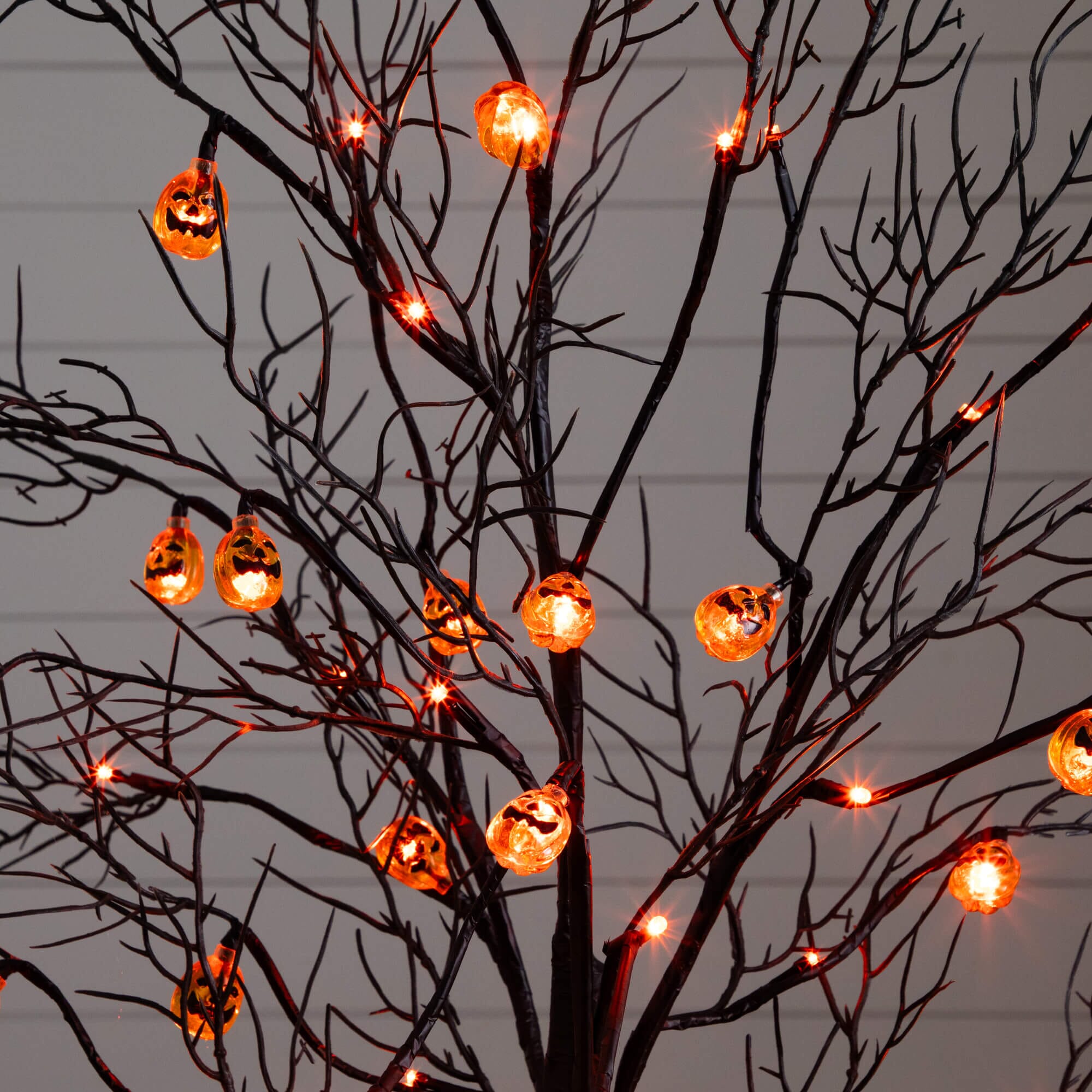 4' Pre-Lit Artificial Halloween Black Twig Tree with 24 Orange LED Pumpkin Shaped Lights