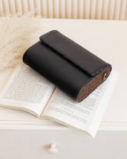 Black Leather and Carved Wood Sling Bag - Che Cose Belle
