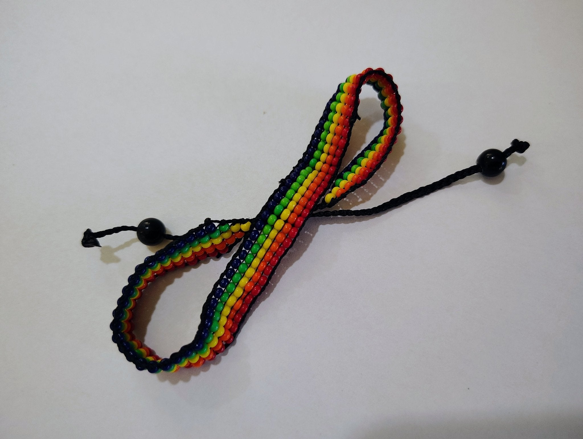 Conservation Pride & Purpose Hand Beaded Bracelet, Rainbow of Maasai Glass Beads - Che Cose Belle