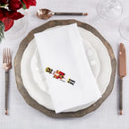 Fennco Styles Embroidered Nutcracker Holiday Cloth Napkins 20" W x 20" L, Set of 4 - White Festive Dinner Napkins for Christmas, Dining Table, Family Gatherings, Banquets & Home Décor - Che Cose Belle