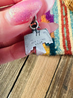 Handcrafted Sterling Silver & Sonoran Mountain Turquoise Thunderbird Pendant - Che Cose Belle