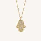 Inspired Action Gold Evil Eye & Hamsa Hand Necklace - Che Cose Belle