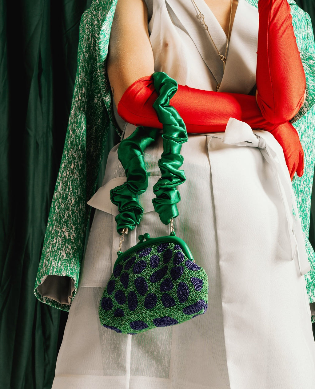 the Arnoldi Jade Clutch Bag In Lush Green & Blue - Che Cose Belle