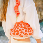 The Arnoldi Peachpuff Clutch Bag In Orange & Peach - Che Cose Belle