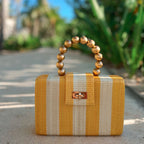 THE LOUISA Yellow & Cream Stripe Woven Straw Clutch Bag - Che Cose Belle